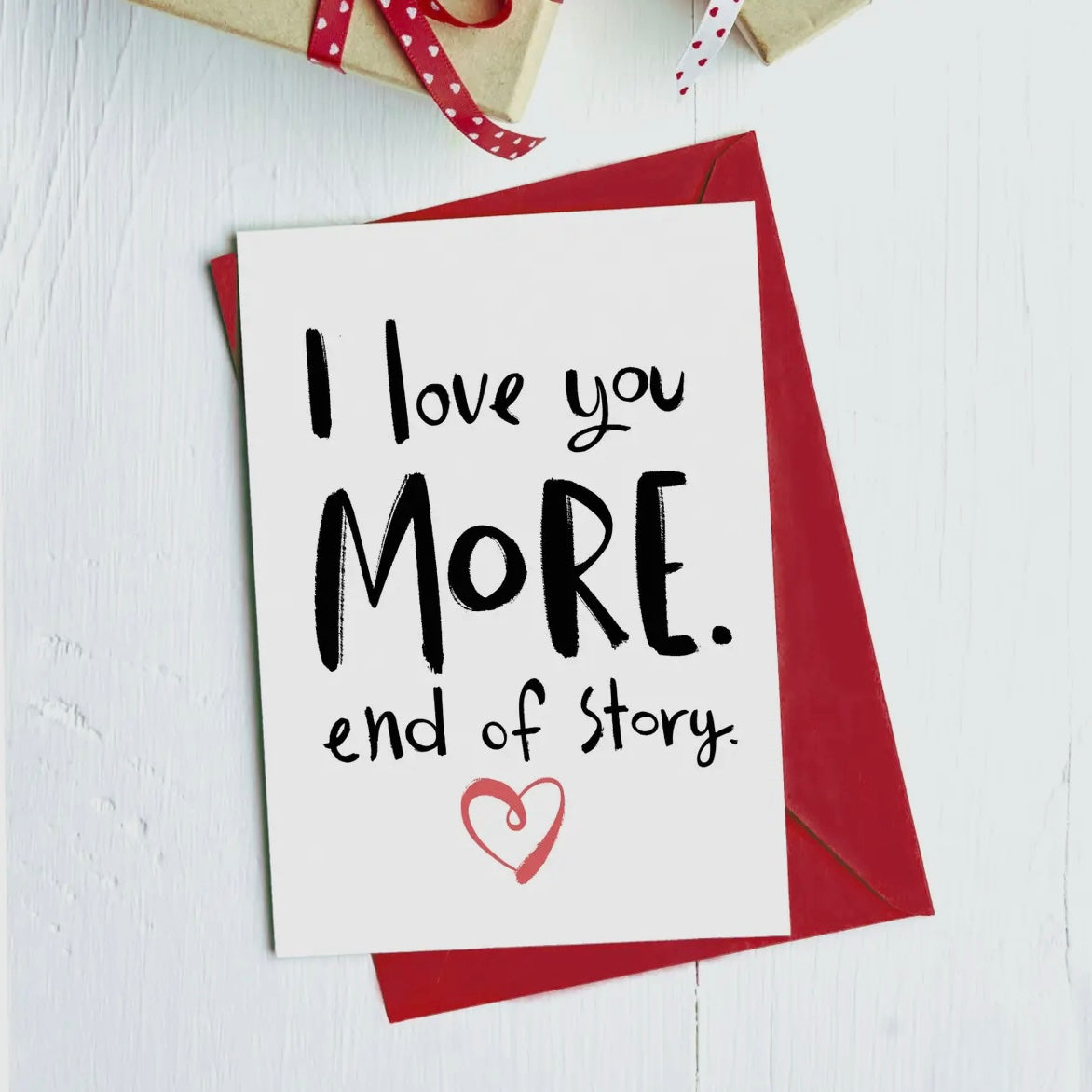 “I Love You More” Greeting Card