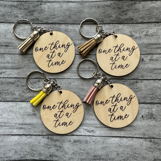 One Thing At A Time Keychain (Random Tassel Color)